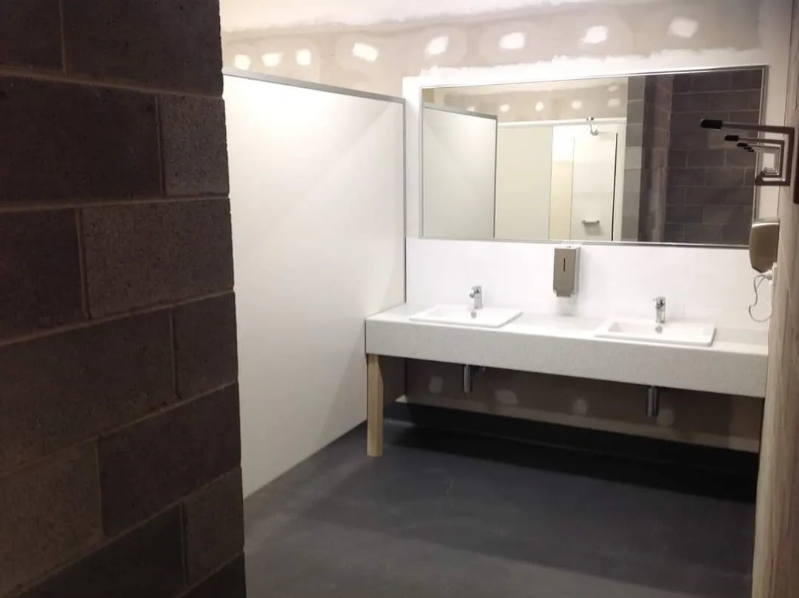 Completed bathroom amenities block with vanity